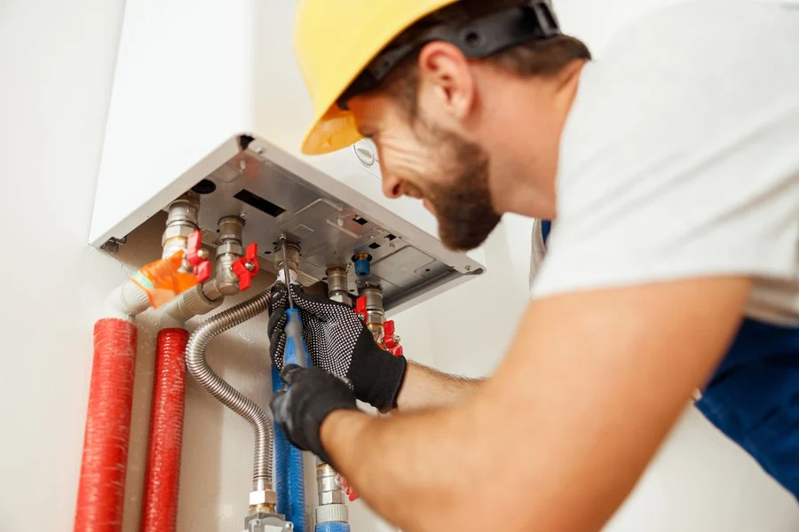 Boiler & Heating Care Ltd engineer servicing a boiler